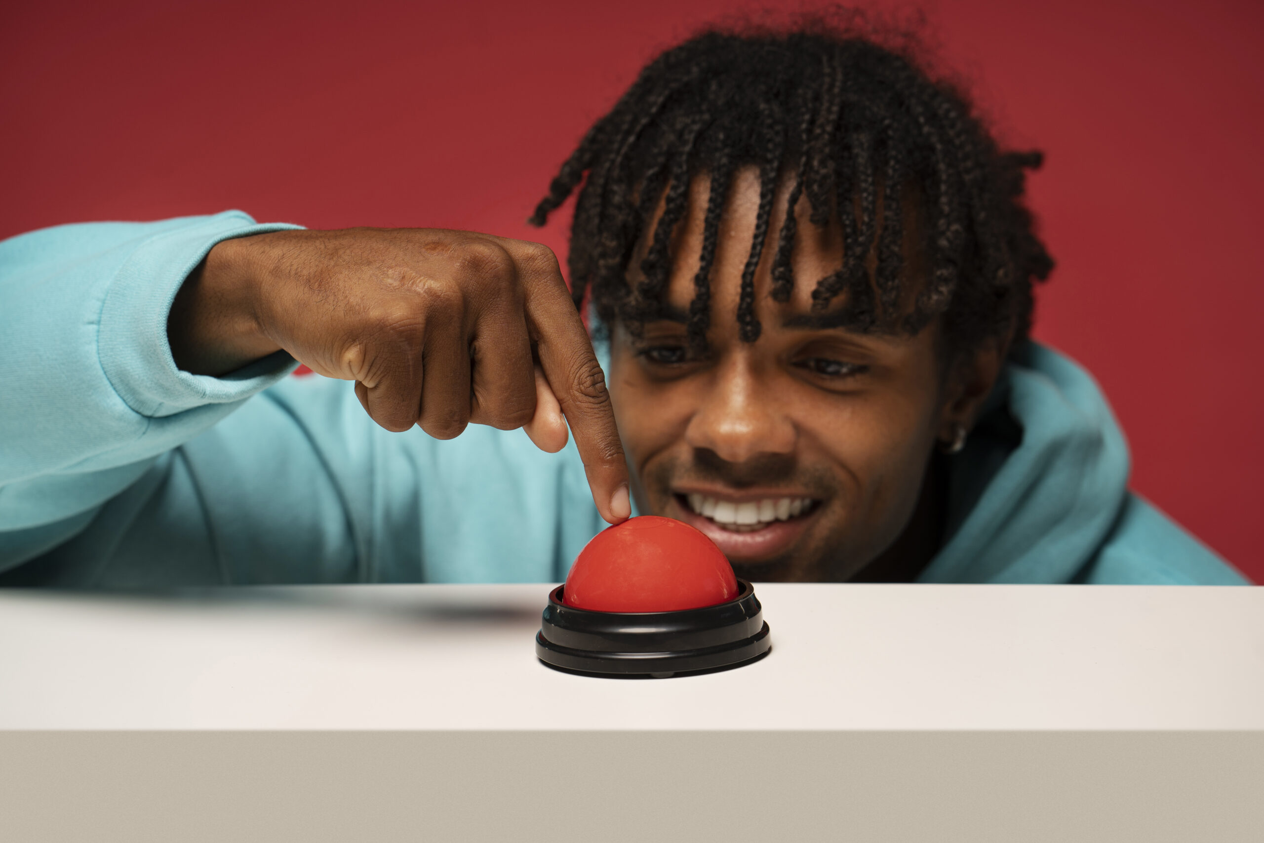 person pressing buzzer